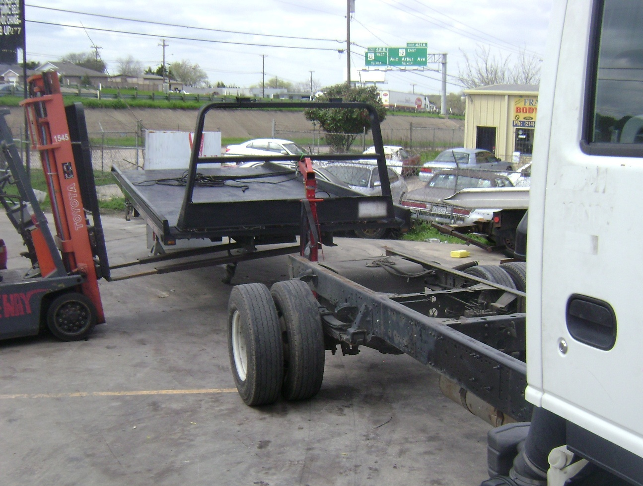 fitting a steel rollback flatbed platform fitting a steel rollback flatbed platform